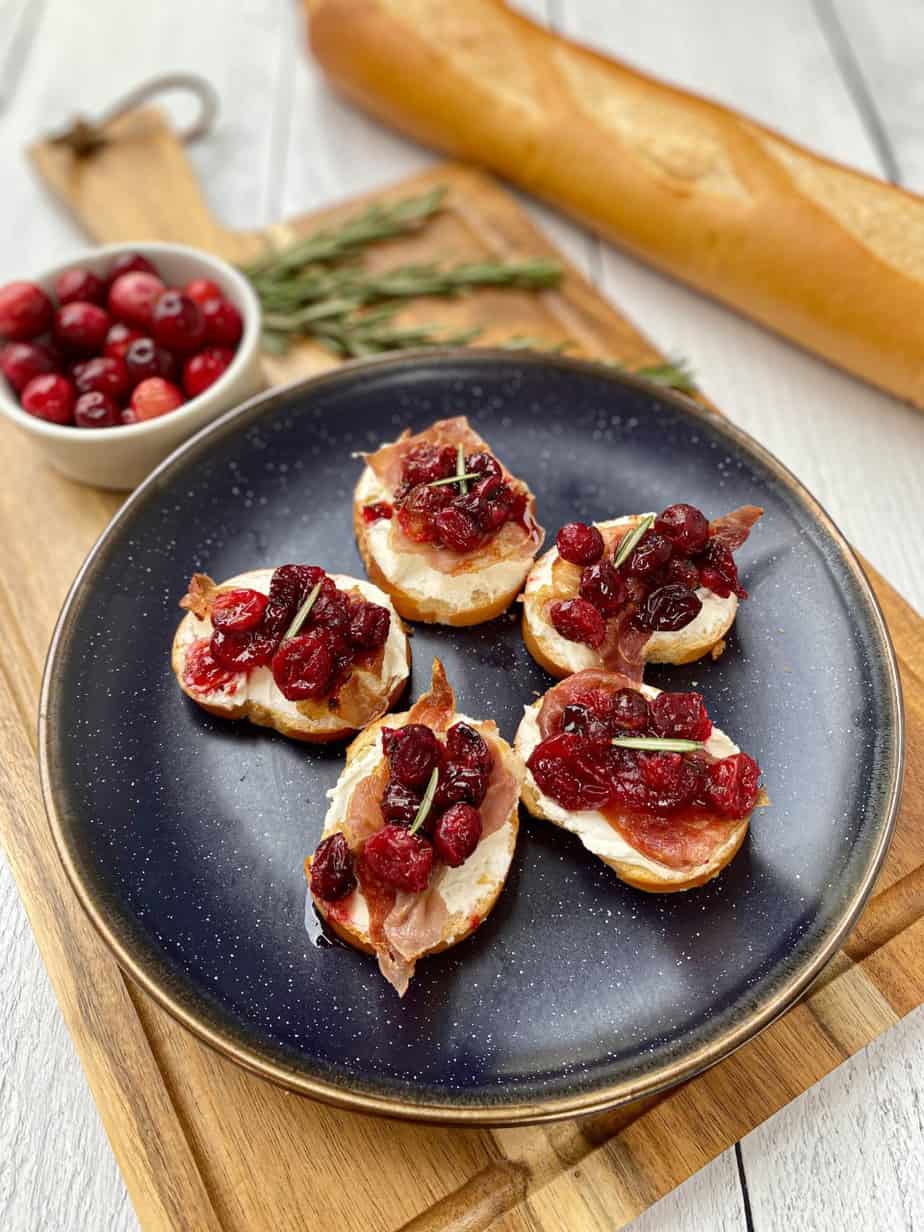 Goat Cheese Crostini With Prosciutto And Cranberries - Happy Honey Kitchen