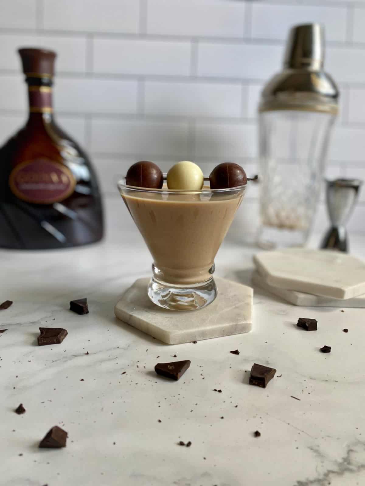 Chocolate Martini cocktail with chocolate candy garnish.