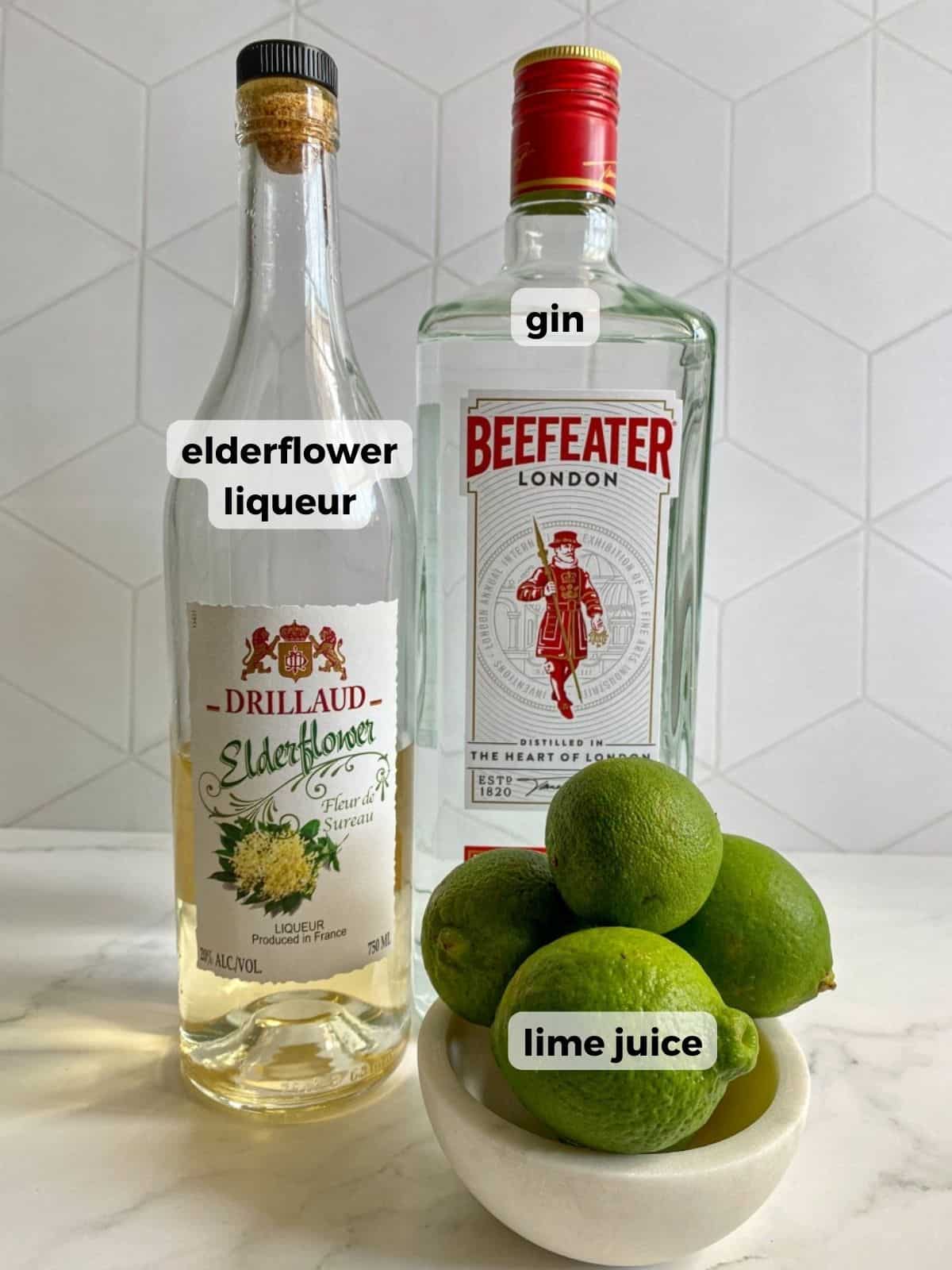 Three ingredients needed to make this cocktail: gin, elderflower liqueur, and fresh limes.