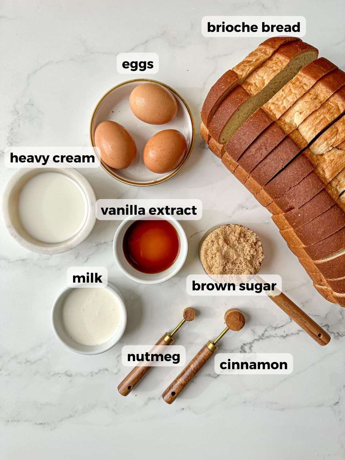 Ingredients needed to make this breakfast recipe include: brioche bread, eggs, milk, heavy cream, brown sugar, vanilla extract, cinnamon, and nutmeg.