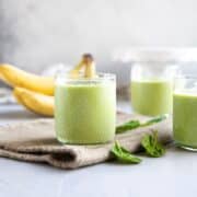 Meal replacement smoothies with greens, fruit, protein, and healthy fats.