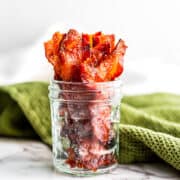 Crispy bacon in a mason jar.