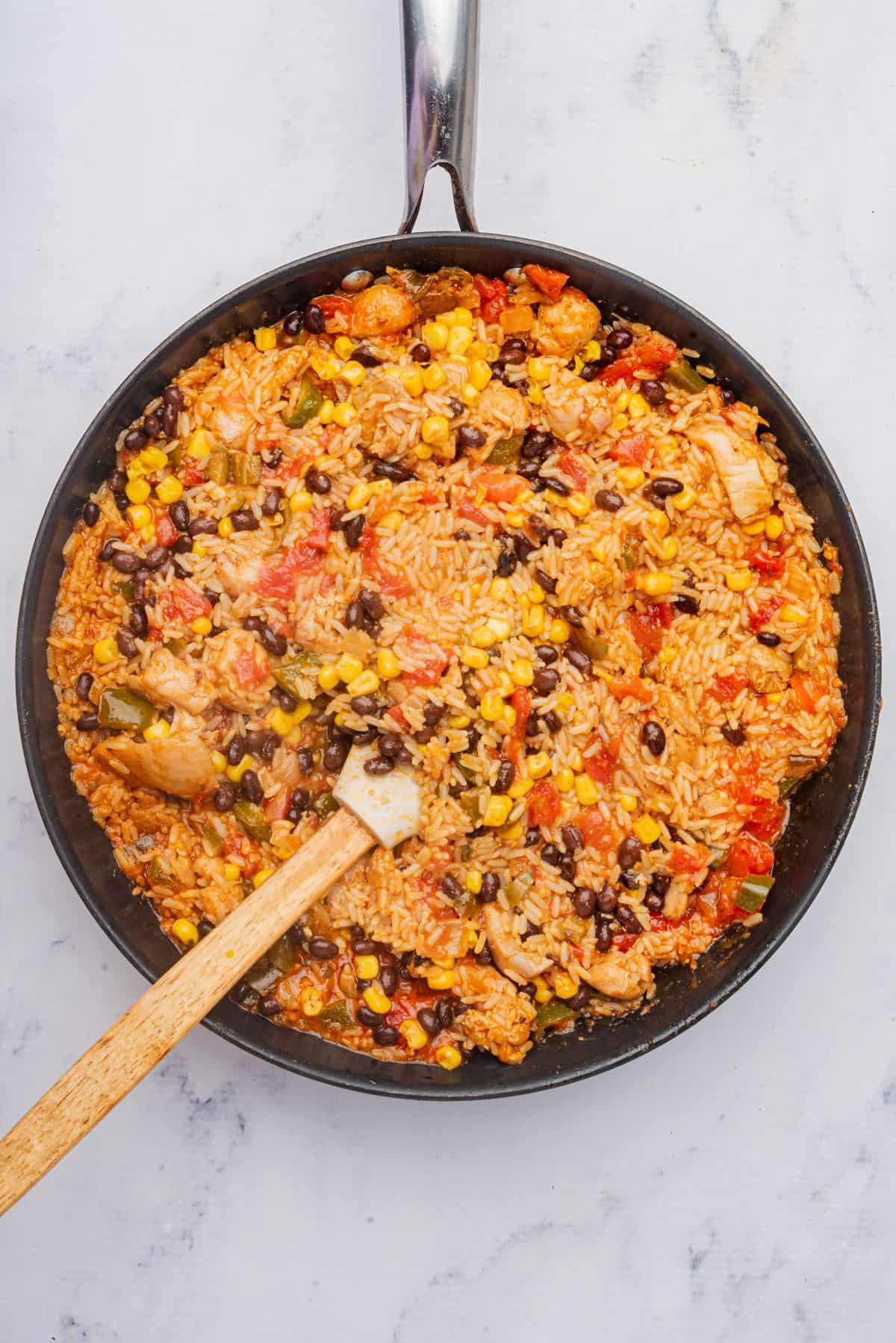 Black beans and corn added to cheesy Mexican rice and chicken.