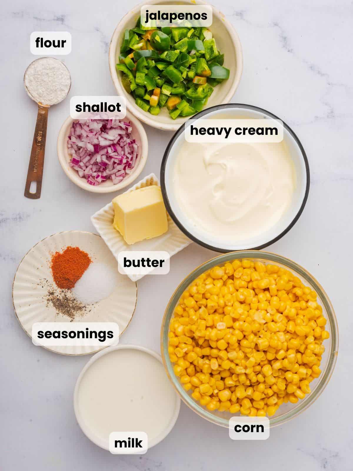 Ingredients needed to make spicy creamed corn with jalapenos.