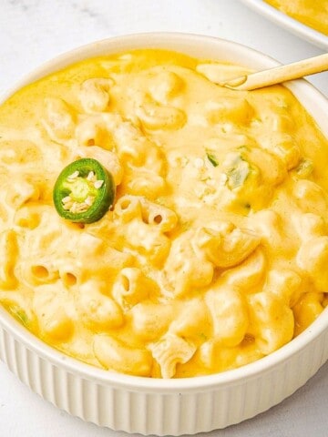 Jalapeno mac and cheese in a bowl with a spoon.