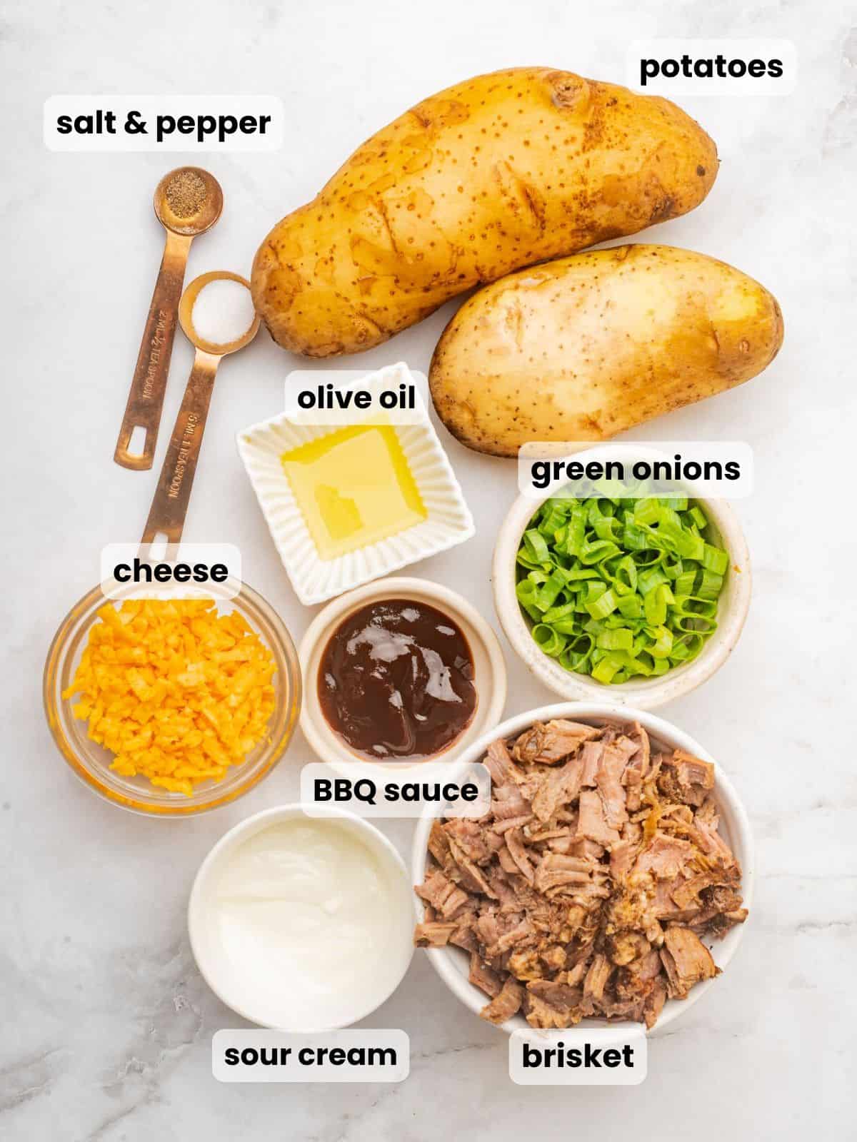 Ingredients needed to make a loaded brisket baked potato.