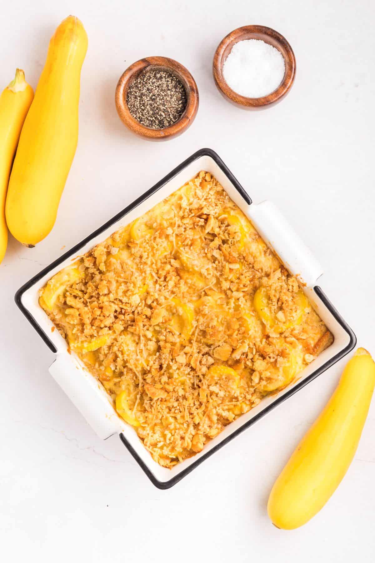 Baked yellow squash casserole with golden Ritz cracker topping.